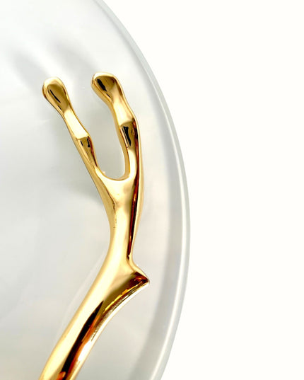 Golden Arc Bricka